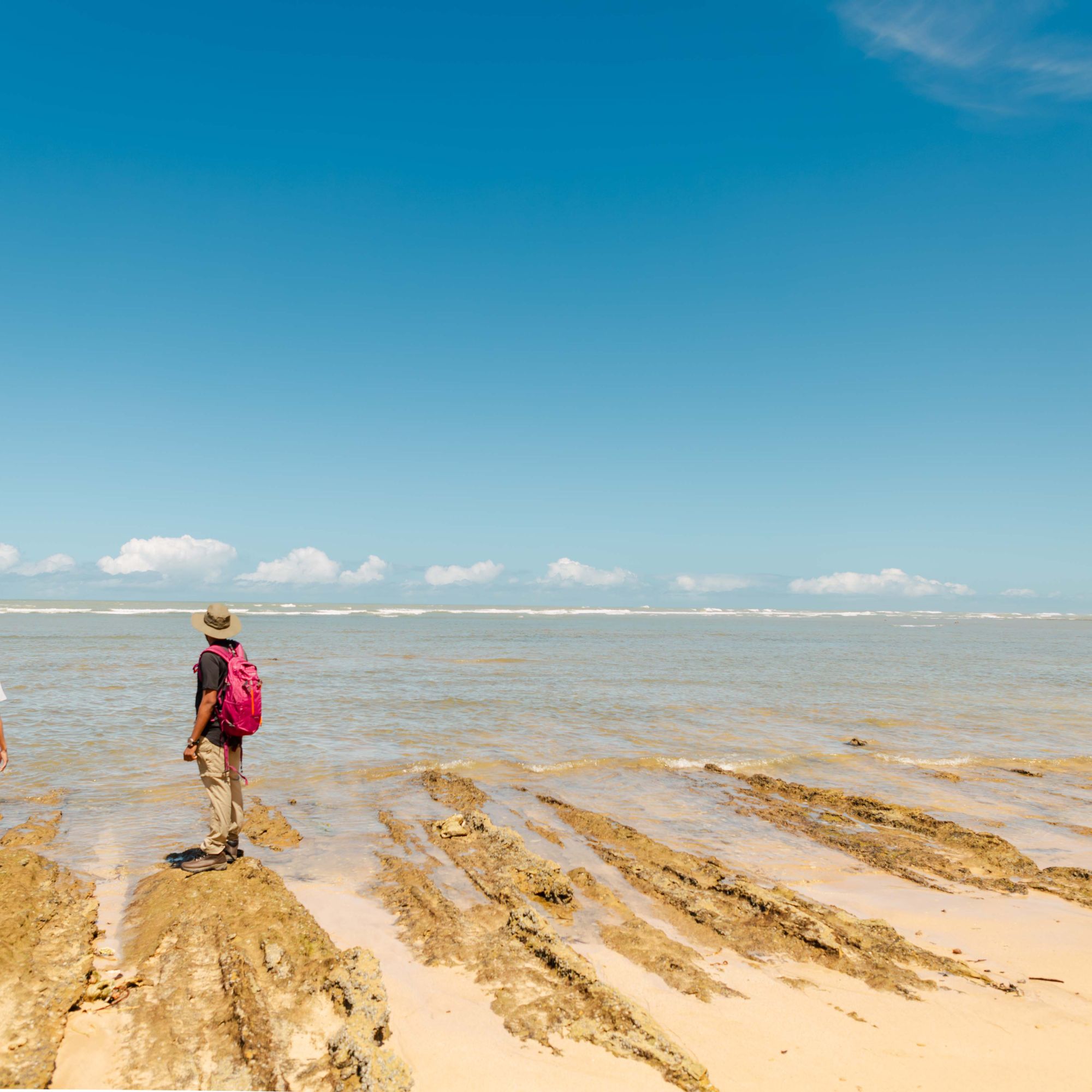 Geelkrans two hikers on the beach Geelkrans two hikers on the beach